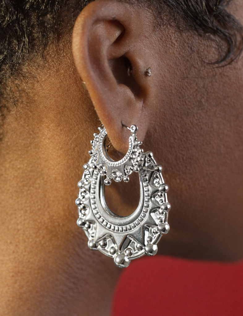 Intricate_silver_earring_and_ear_details_14268abc-f2f9-4ad0-a198-632948fea05d.png